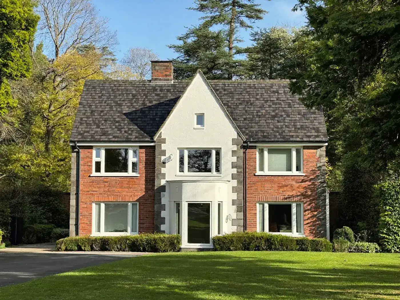 Beaconsfield: newly built brick detached family house with a tiled roof and driveway