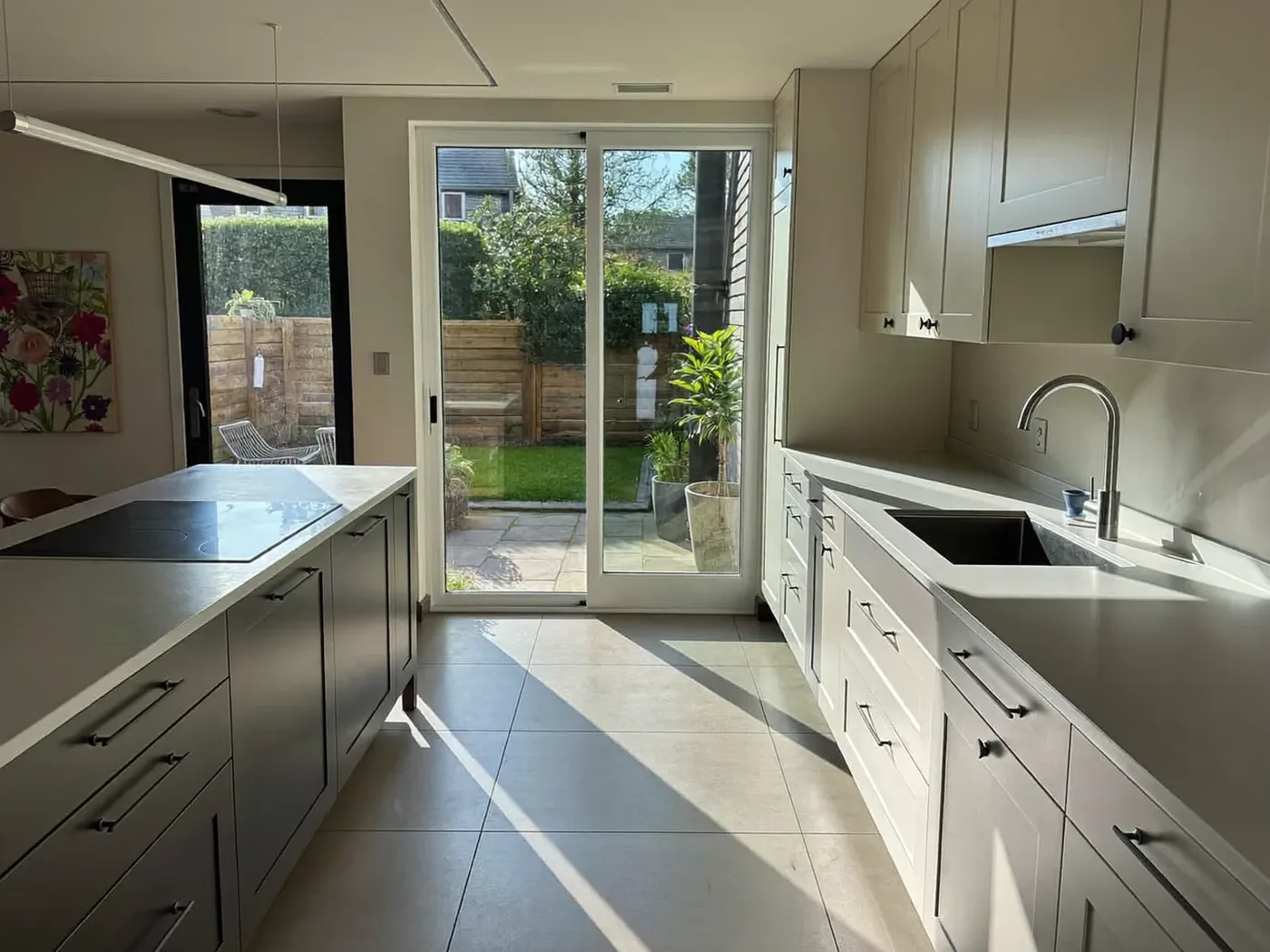 Hammersmith & Fulham: family kitchen in a new rear extension with sliding doors to the garden