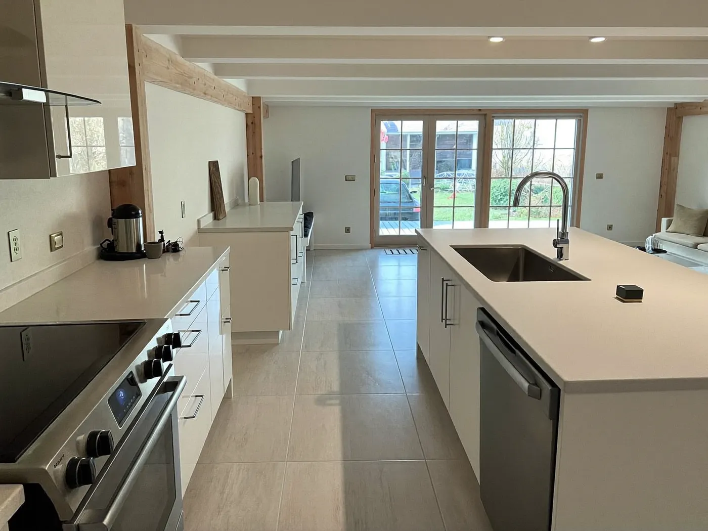 High Wycombe: family kitchen in a new rear extension with sliding doors to the garden