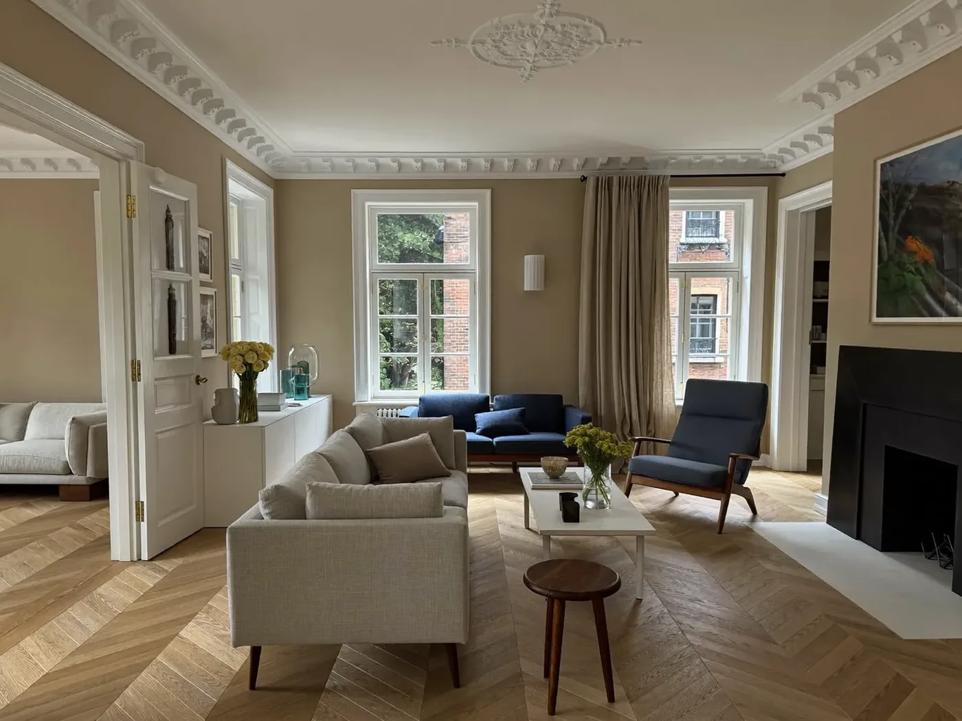 Southwark: renovated living room with painted walls and wooden flooring