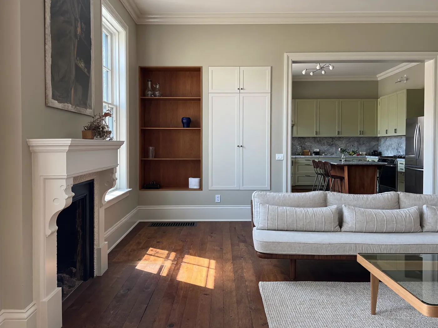 Westminster: renovated living room with painted walls and wooden flooring