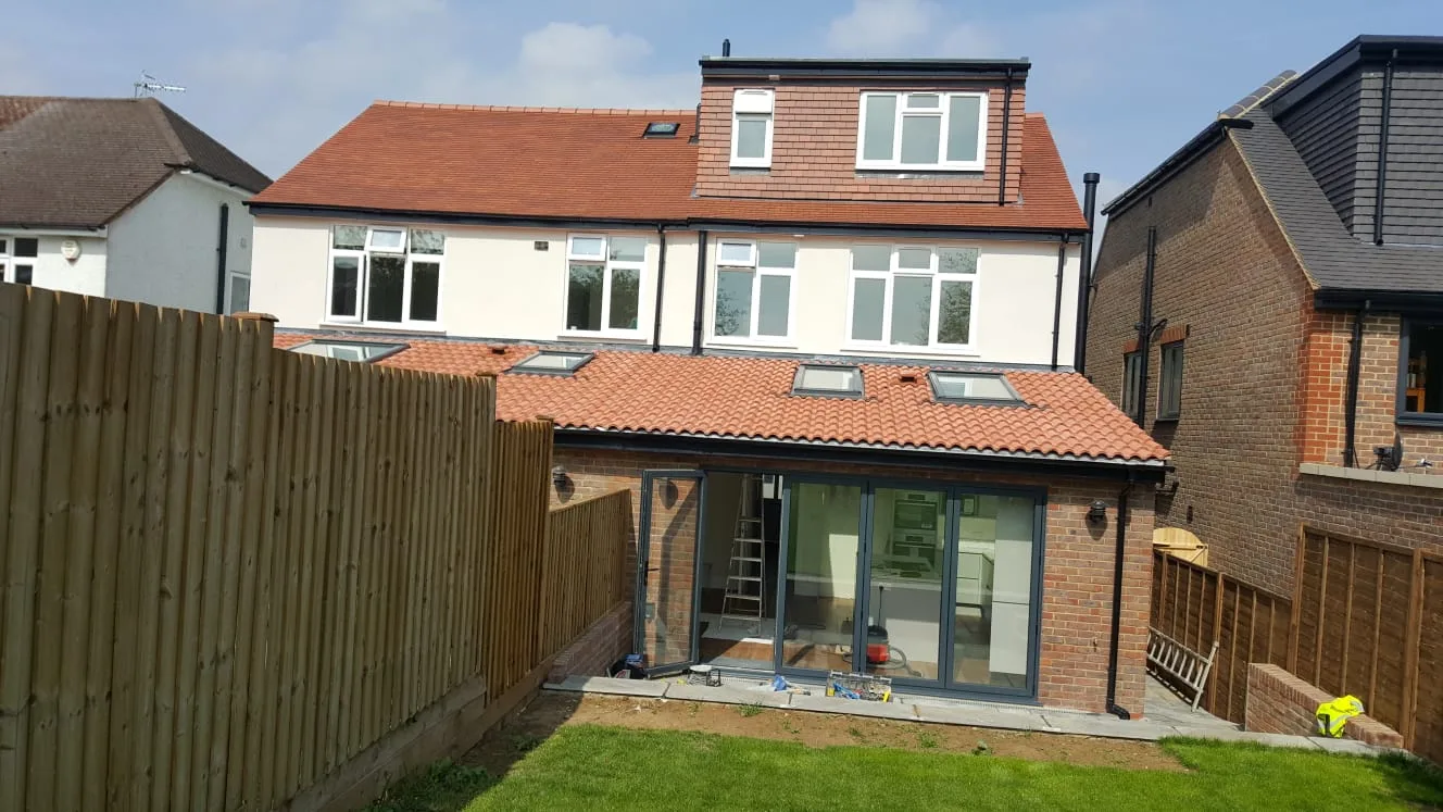 Brick extension and dormer on a semi-detached house