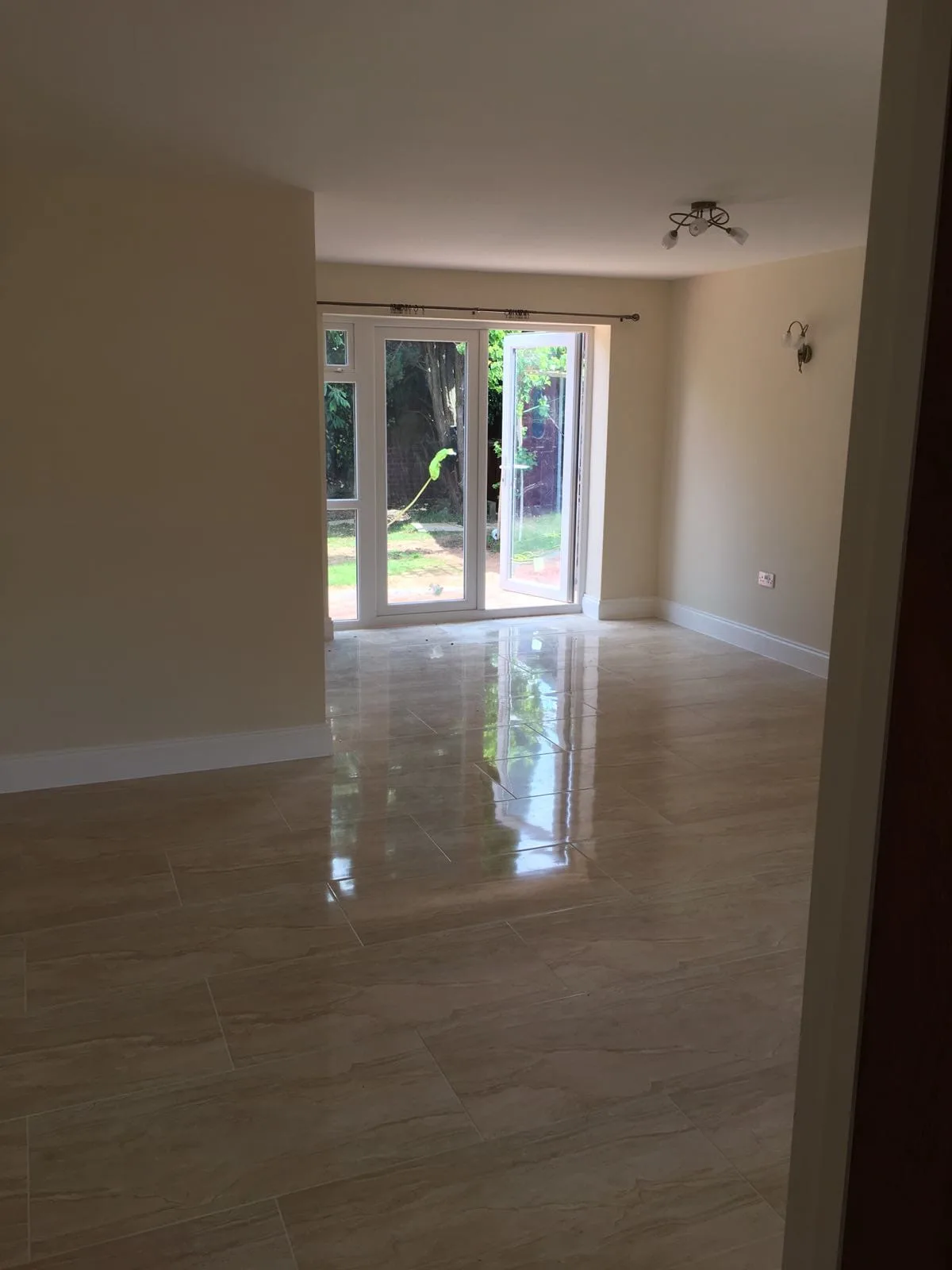 Polished Tile Floor Extension, Enfield: a photo from this project in our portfolio